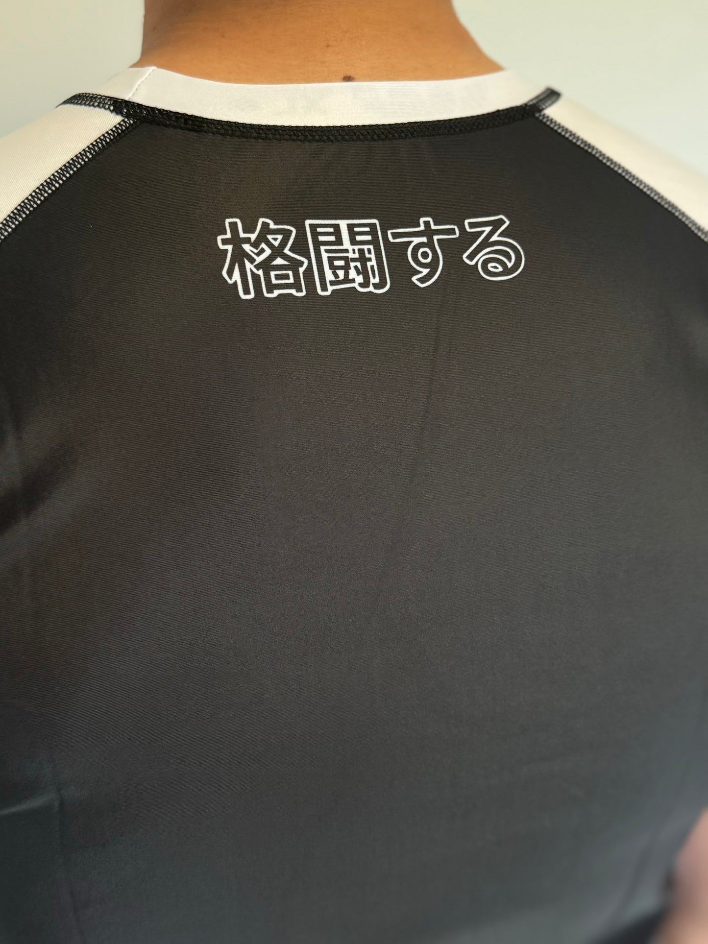 Rashguard KUMAI – Edition "Compétition Noir & Blanc"
